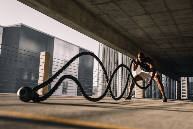 Man working out in a parking deck